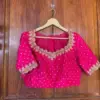 Graceful Pink Cutwork Maggam Blouse – A Timeless Elegance