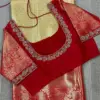 Eye-Catching Red Blouse with Intricate Cutwork Embellishments