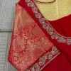 Eye-Catching Red Blouse with Intricate Cutwork Embellishments