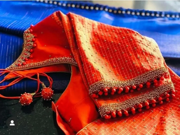 Classic Orange Blouse with Minimal Work – Timeless Fashion