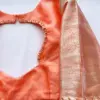 Elegant Glow – Orange Minimal Aari Work Blouse for Chic Occasions