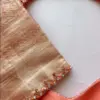 Elegant Glow – Orange Minimal Aari Work Blouse for Chic Occasions