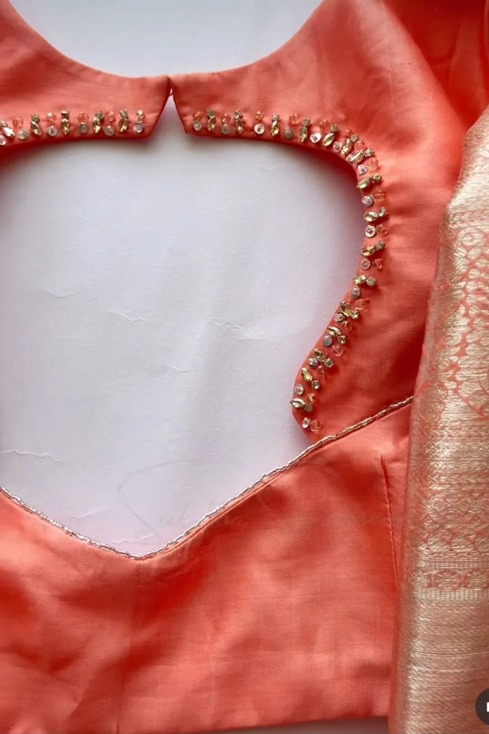 Elegant Glow – Orange Minimal Aari Work Blouse for Chic Occasions