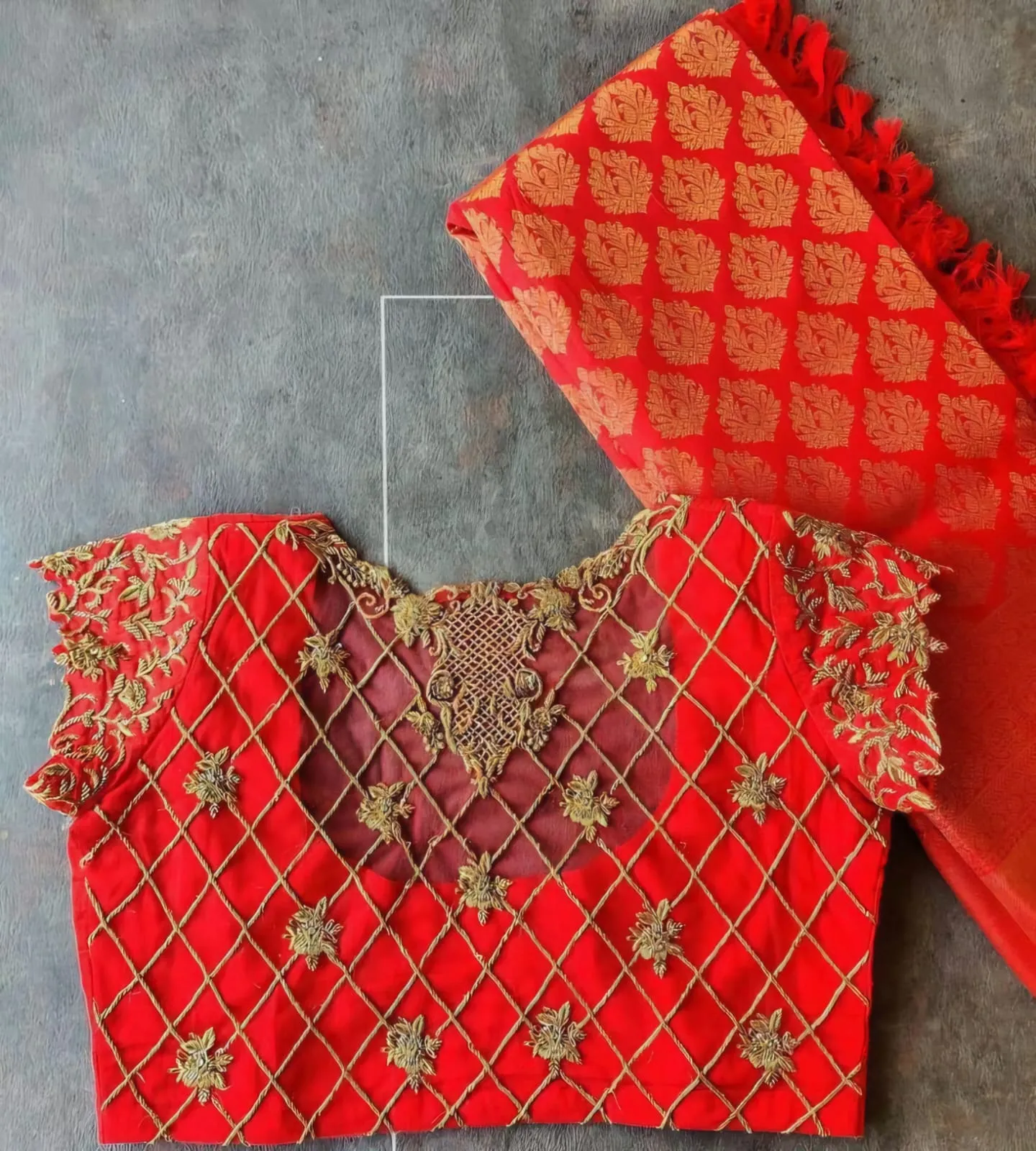 Grace Unveiled – Mesmerizing Red Net Blouse for Bridal Magic