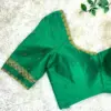 Graceful Charm – Green Net Raw Silk Blouse with Elegant Maggam Touch