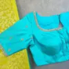 Elegant Sky Blue Net Aariwork Blouse with Designer Neckline – Trending Bridal Pick