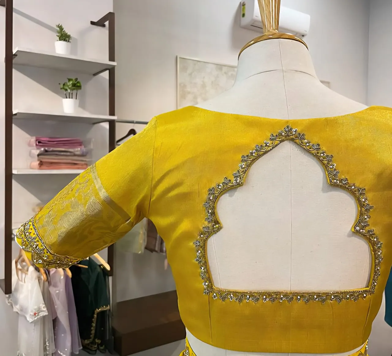 Sunshine Glow: Yellow Cutwork Maggam Blouse for Trendsetting Brides