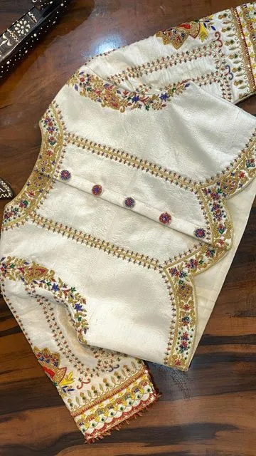 Timeless Elegance: Half White Raw Silk Blouse with Unique Maggam Craftsmanship