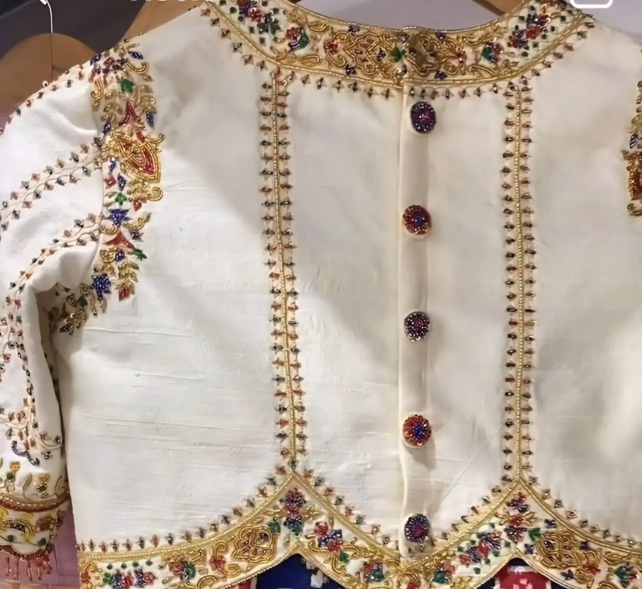 Timeless Elegance: Half White Raw Silk Blouse with Unique Maggam Craftsmanship