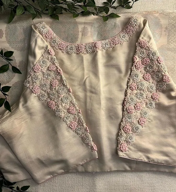 Chic in White Rose Stitch Boat Neck Blouse with Signature Maggam Detailing