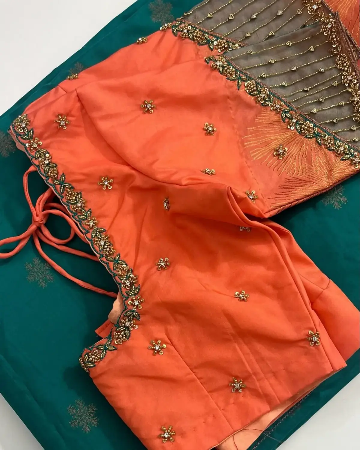 Chic Orange Designer Net Blouse Perfect for Festive Glam