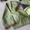Elegant CharmPastel Green Minimal Maggam Work Blouse for Graceful Occasions