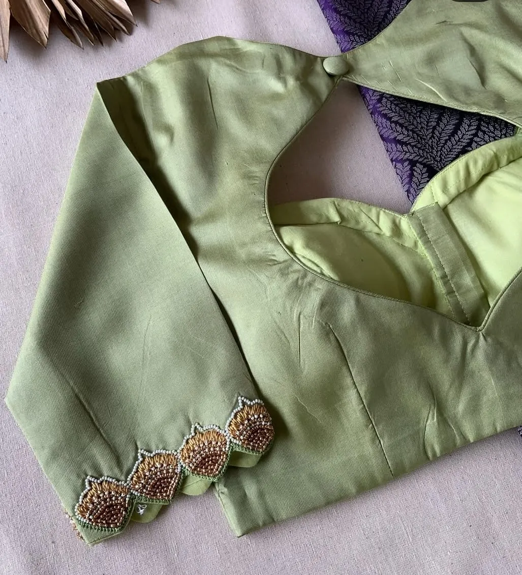 Elegant CharmPastel Green Minimal Maggam Work Blouse for Graceful Occasions