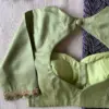 Elegant CharmPastel Green Minimal Maggam Work Blouse for Graceful Occasions