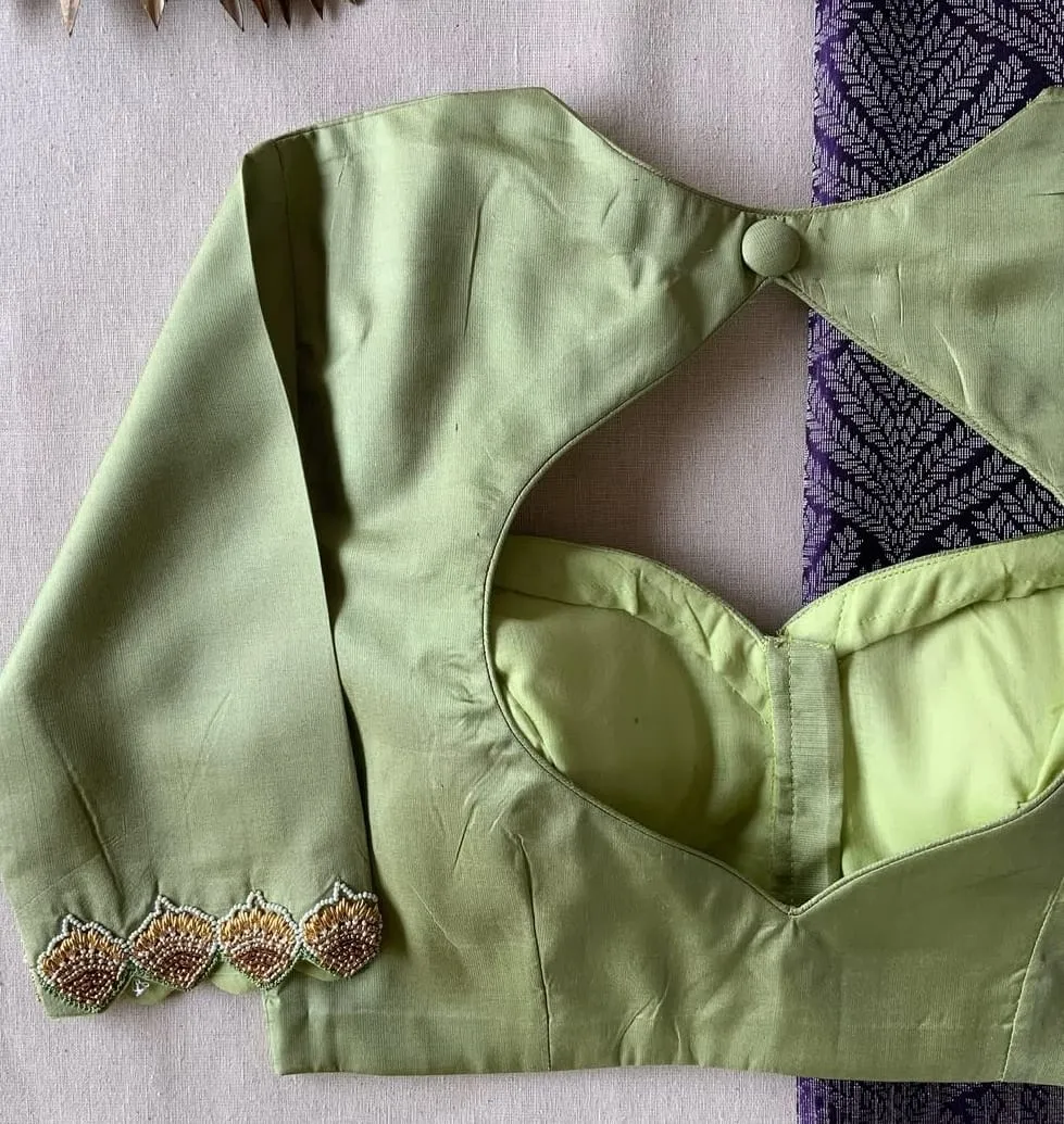 Elegant CharmPastel Green Minimal Maggam Work Blouse for Graceful Occasions