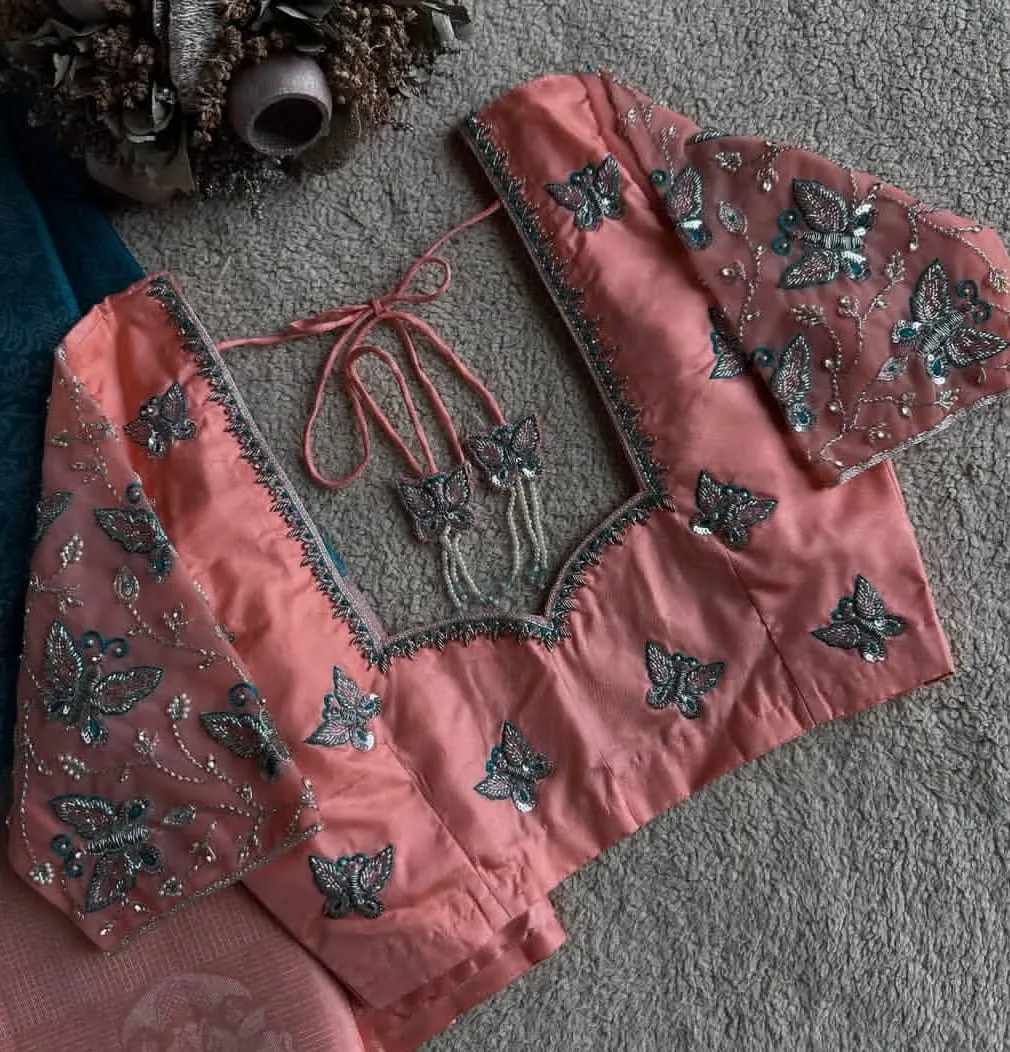 Ethereal ElegancePeach Net Maggam Work Blouse for Special Occasions