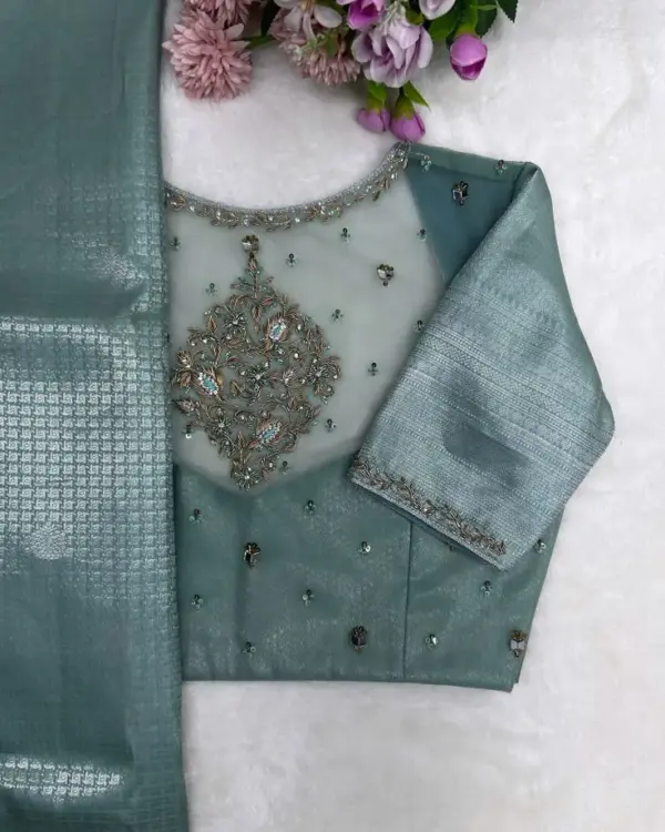Fresh & Flawless: Mint Green Maggam Blouse with Elegant Detailing