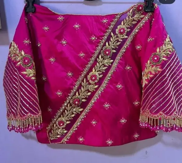 Royal RadianceRani Pink Net Bridal Blouse with Exquisite Handwork