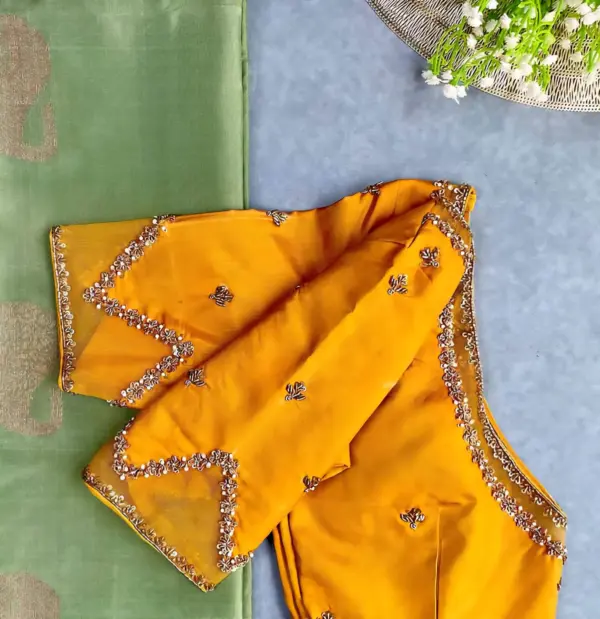 Stunning Mustard Yellow Net Blouse with Intricate Maggam Embroidery