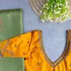Stunning Mustard Yellow Net Blouse with Intricate Maggam Embroidery