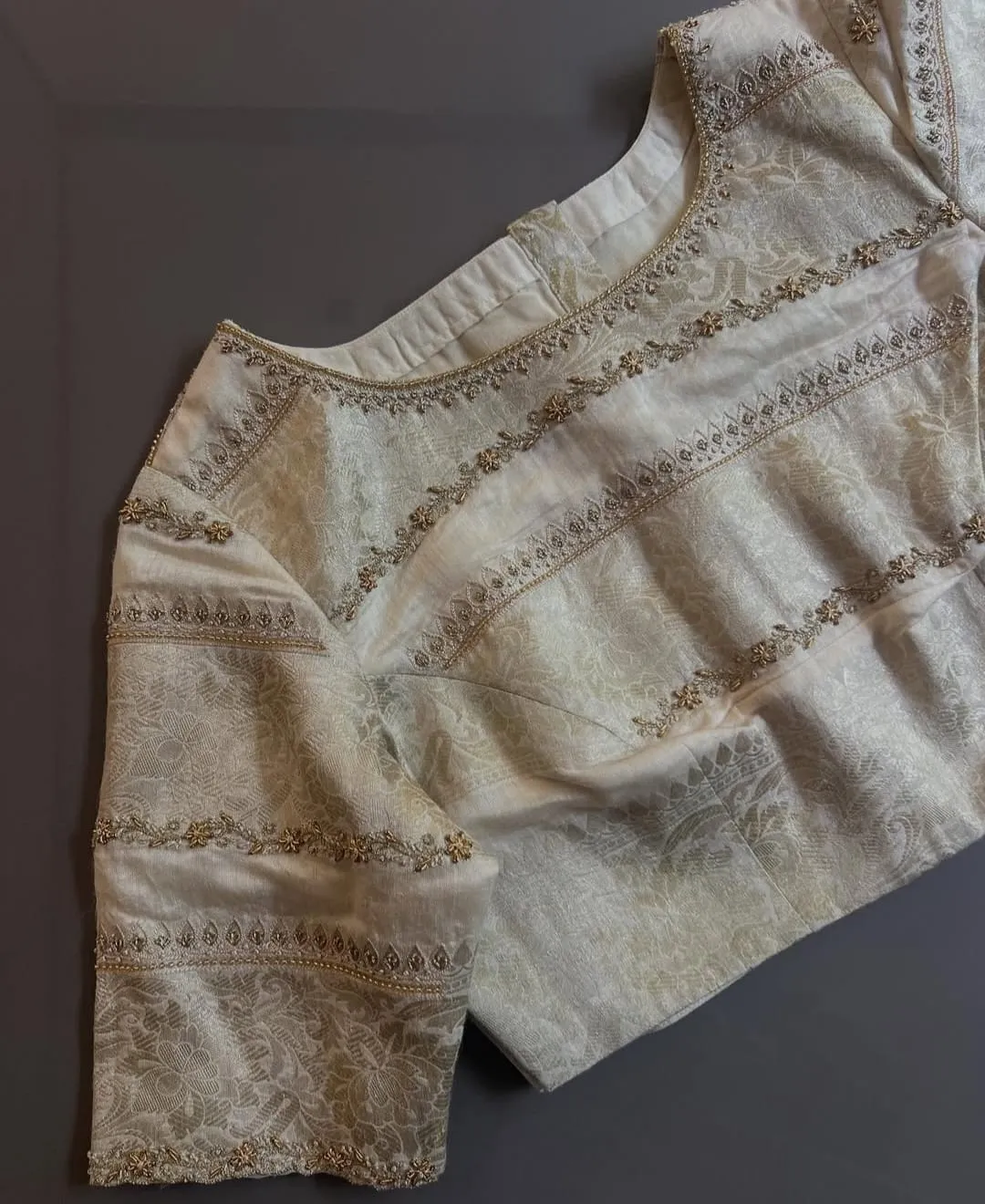 Cream Bridal Maggam Work Blouse with Intricate Lines Design