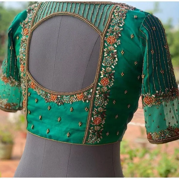 Green Net Partywear Designer Blouse with Stylish Line Detailing Elegant Ethnic Fashion for Weddings & Events