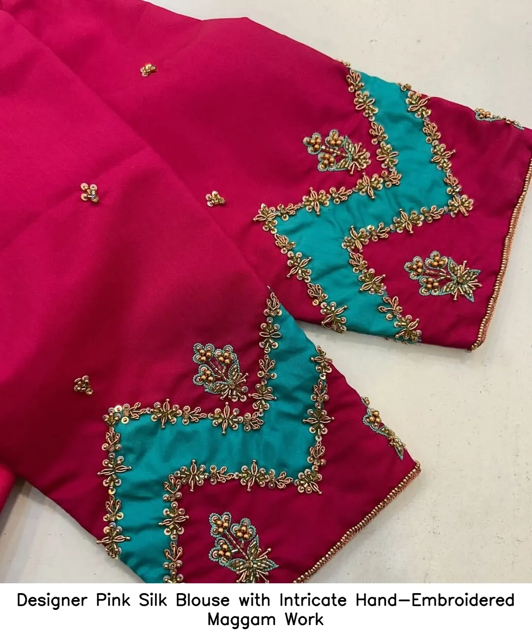 ​Designer Pink Silk Blouse with Intricate Hand-Embroidered Maggam Work