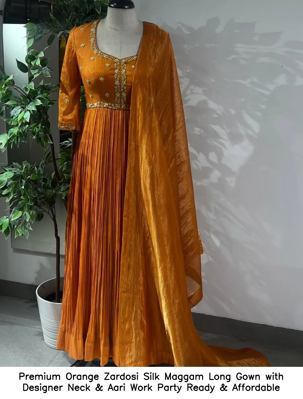​​Premium Orange Zardosi Silk Maggam Long Gown with Designer Neck & Aari Work – Party Ready & Affordable