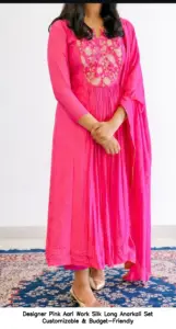 Elegant Anarkali suit set with intricate embroidery and flowing silhouette