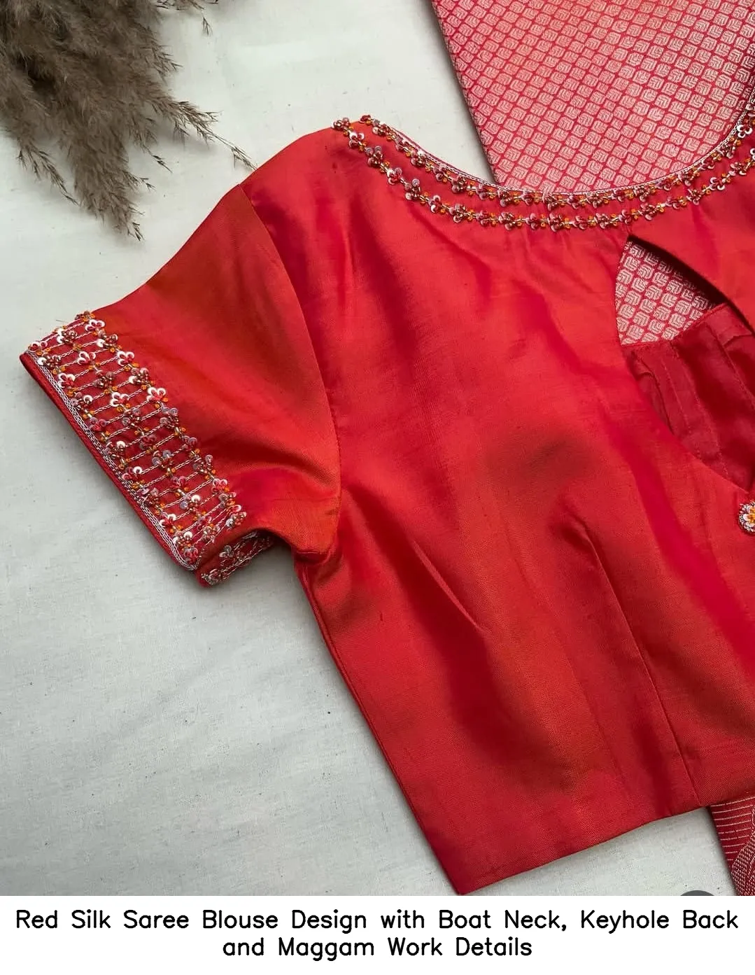 Red Silk Saree Blouse Design with Boat Neck, Keyhole Back and Maggam Work Details