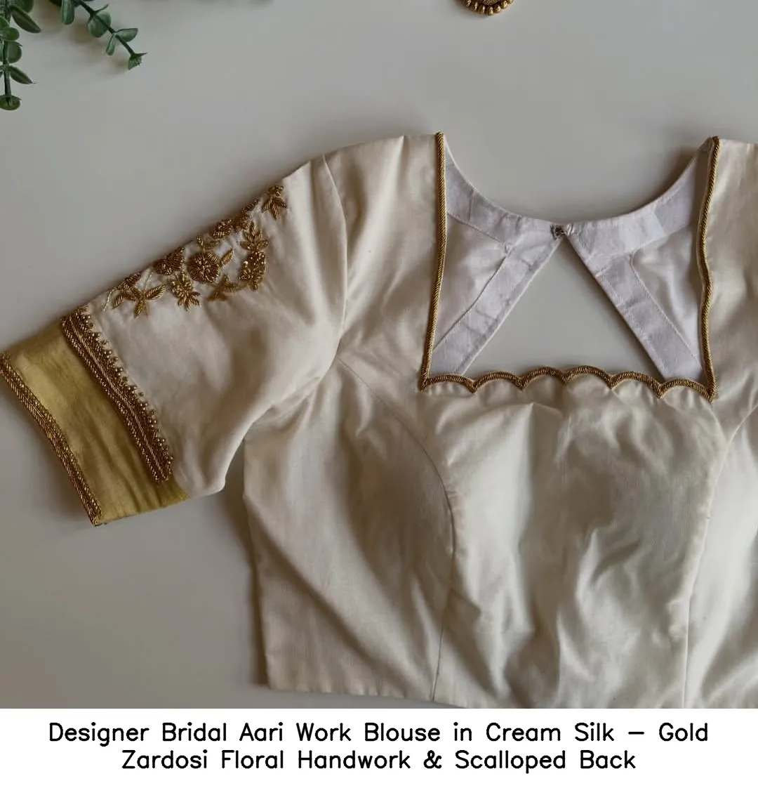 ​​​Designer Bridal Aari Work Blouse in Cream Silk - Gold Zardosi Floral Handwork & Scalloped Back