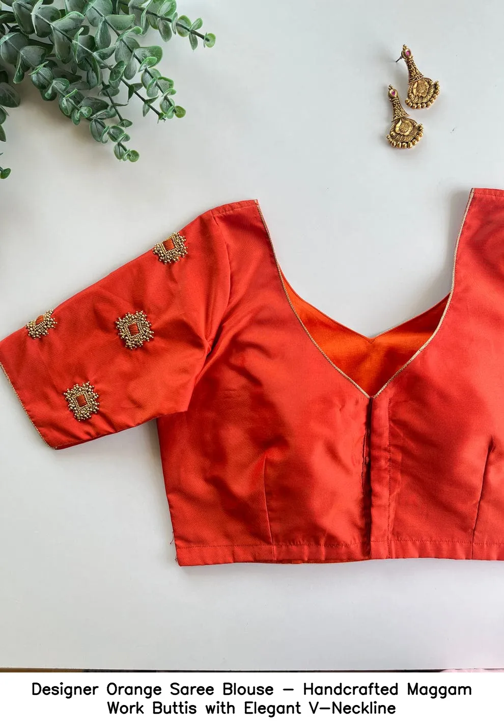 ​​​​Designer Orange Saree Blouse - Handcrafted Maggam Work Buttis with Elegant V-Neckline