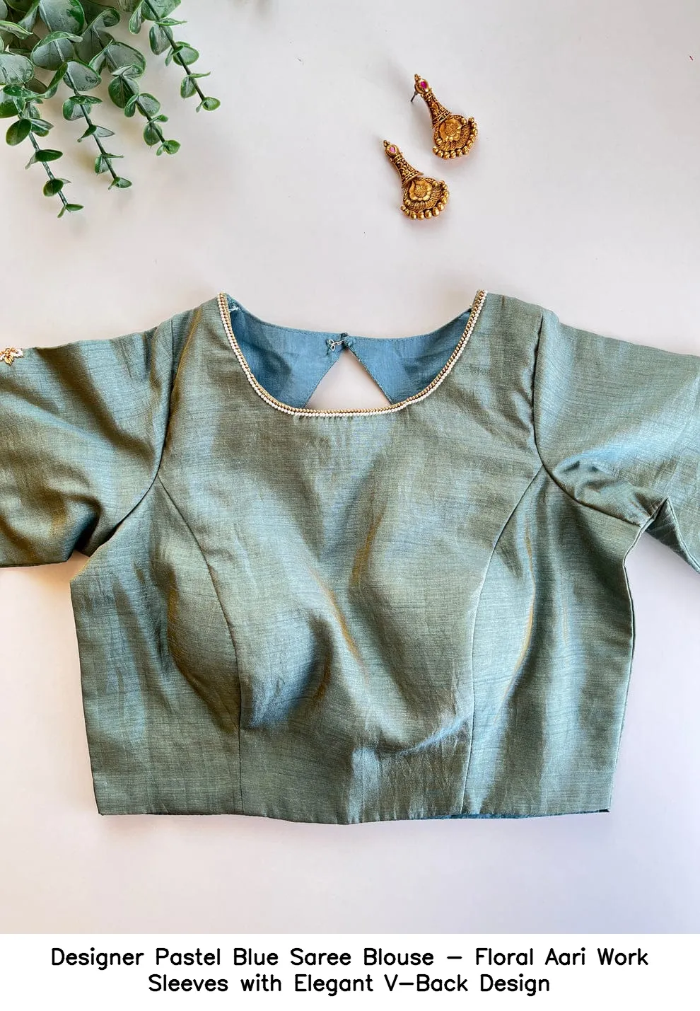 ​​​​Designer Pastel Blue Saree Blouse - Floral Aari Work Sleeves with Elegant V-Back Design