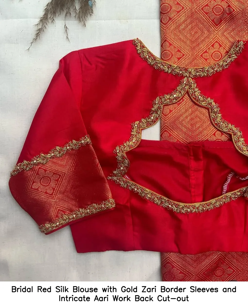 ​​​​​Bridal Red Silk Blouse with Gold Zari Border Sleeves and Intricate Aari Work Back Cut-out