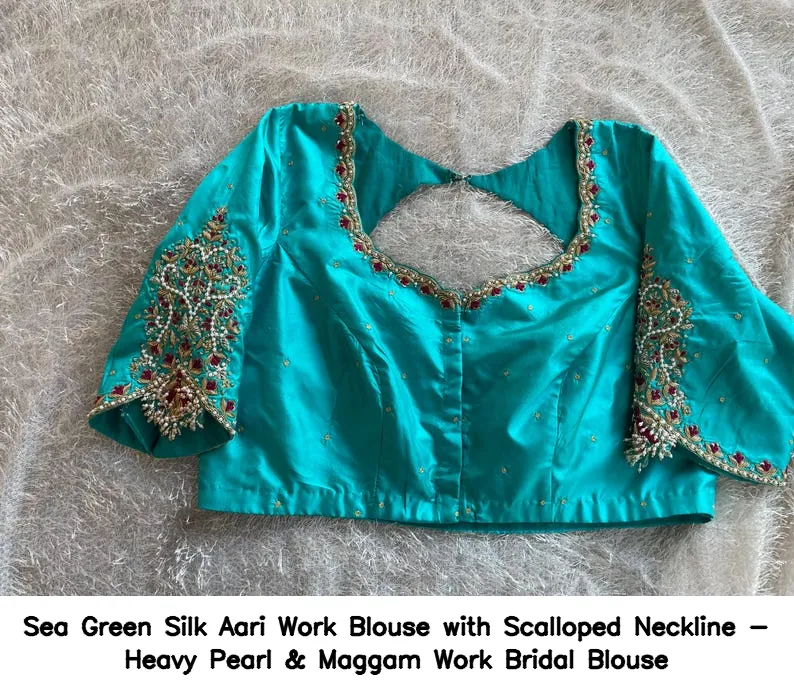 ​​​​​Sea Green Silk Aari Work Blouse with Scalloped Neckline - Heavy Pearl & Maggam Work Bridal Blouse