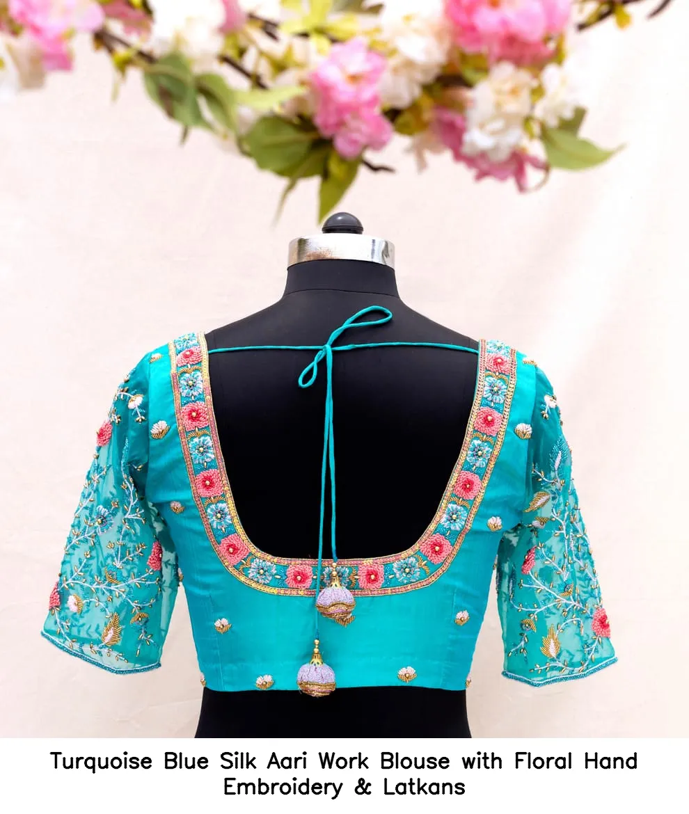 ​​​​​​​​Turquoise Blue Silk Aari Work Blouse with Floral Hand Embroidery & Latkans