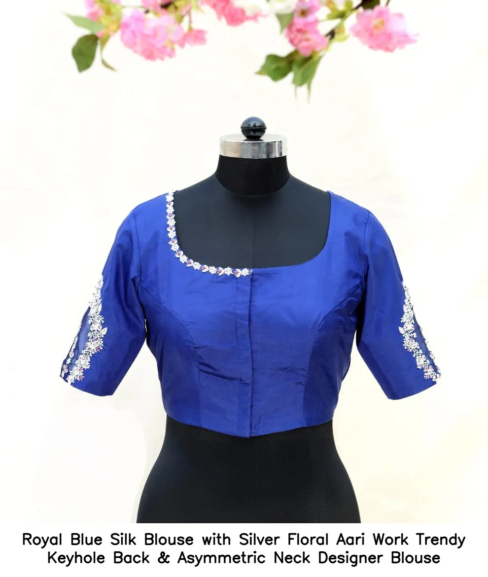 ​​Royal Blue Silk Blouse with Silver Floral Aari Work – Trendy Keyhole Back & Asymmetric Neck Designer Blouse